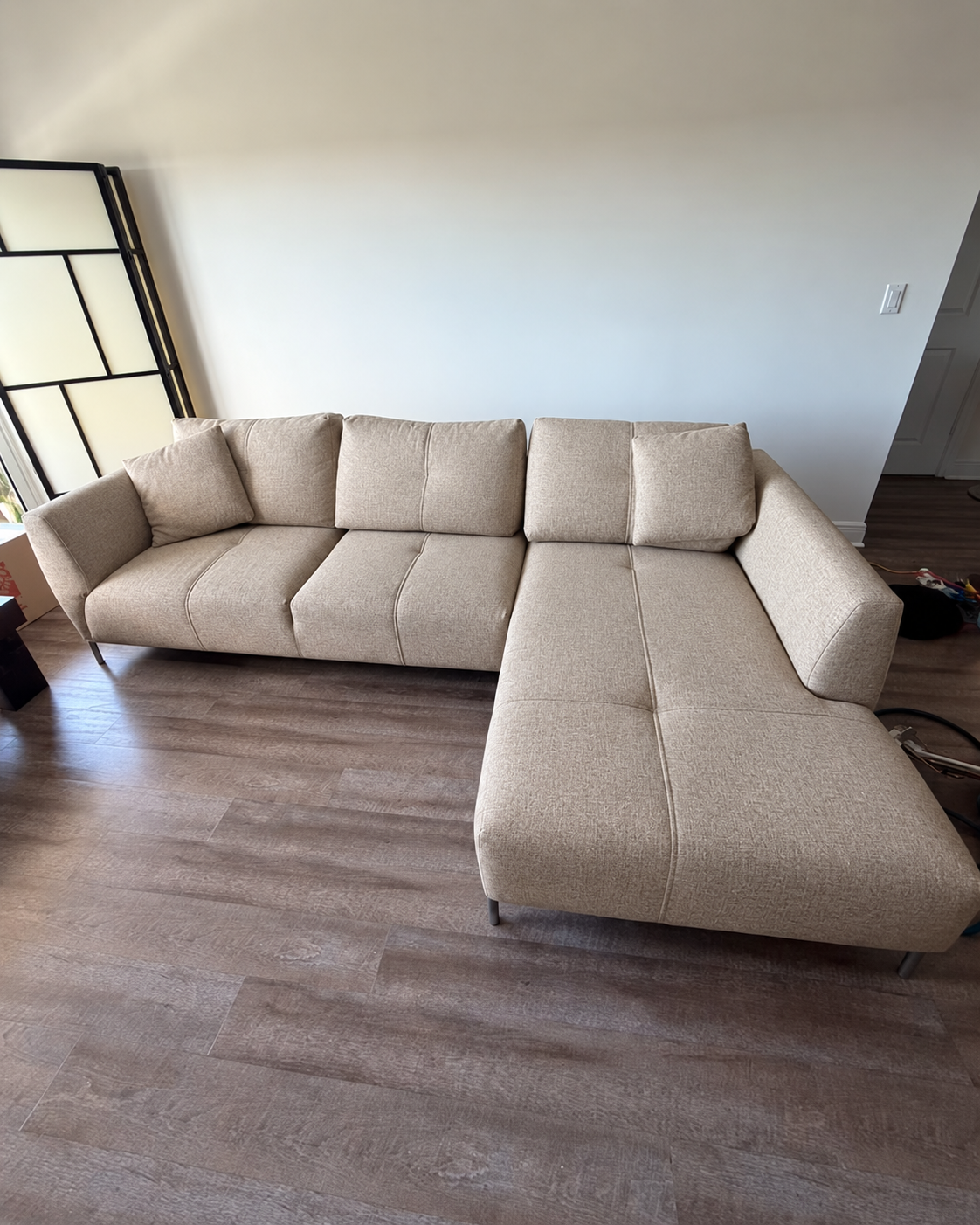 The same sectional sofa visibly clean and refreshed after professional upholstery cleaning