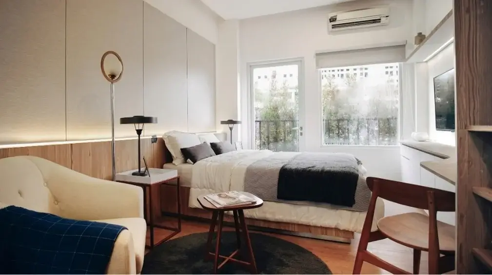 Tidy vacation rental bedroom with a freshly made bed, ready for the next guests